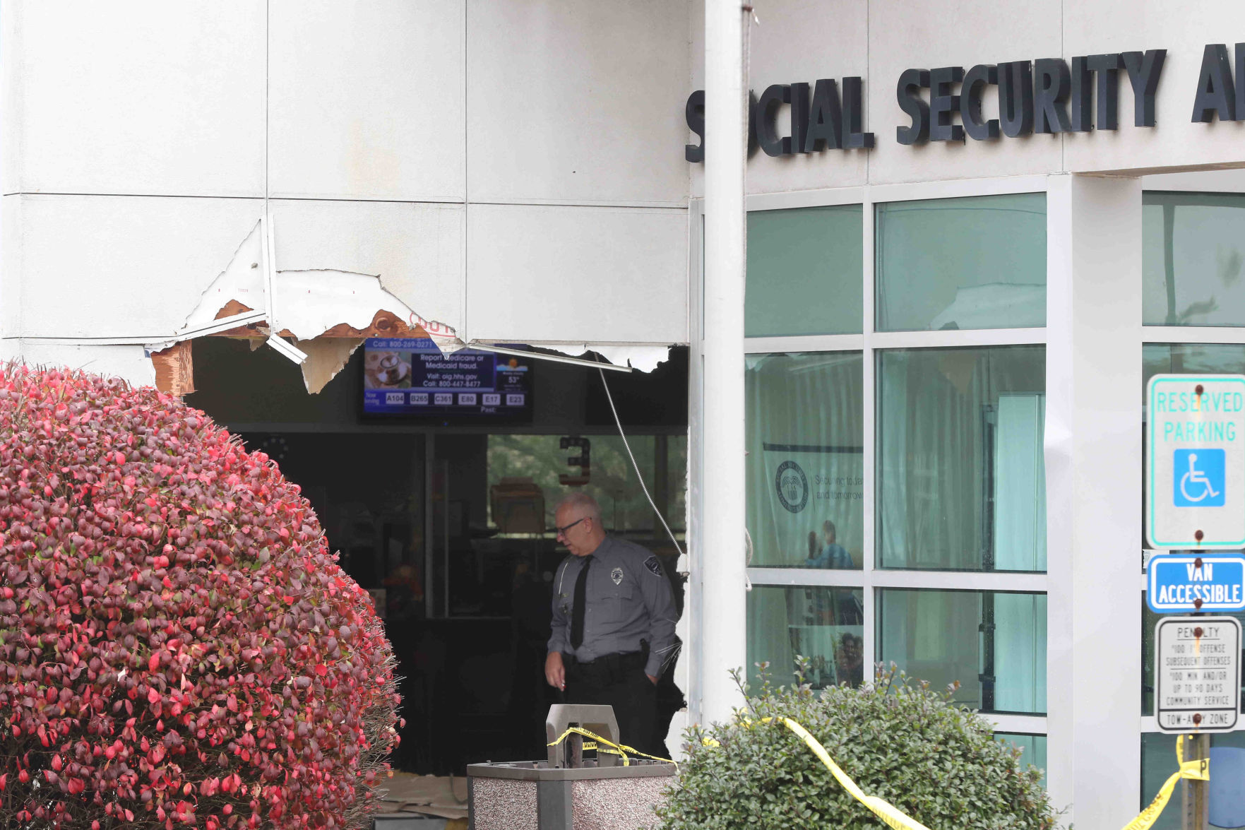 Car crash through Social Security Building
